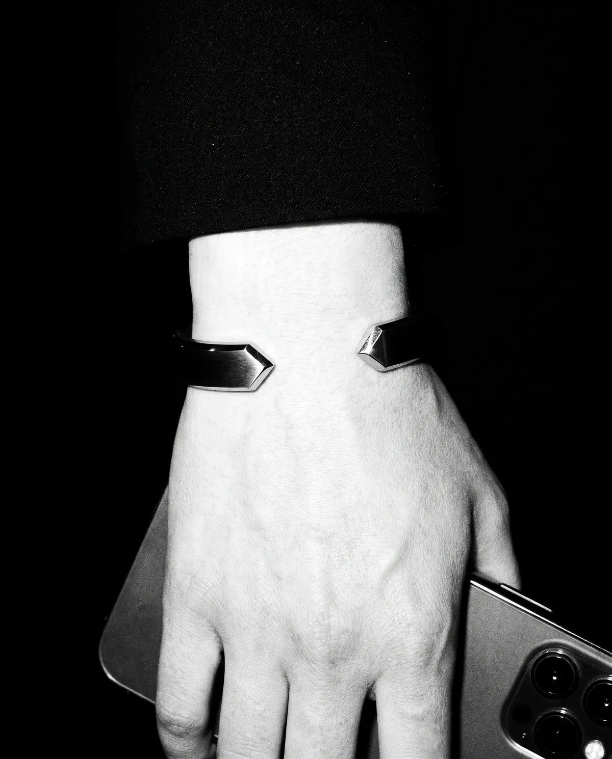 Close up of the faceted cuff: the two ends, in stainless steel.